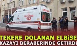 TEKERE DOLANAN ELBİSE KAZAYI BERABERİNDE GETİRDİ