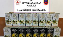 ÜRETTİĞİ SAHTE ZEYTİNYAĞLARINI SATAMADAN JANDARMAYA YAKALANDI