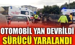 OTOMOBİL YAN DEVRİLDİ, SÜRÜCÜ YARALANDI