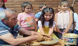Minik eller çömlekle buluştu