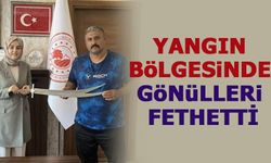 YANGIN  BöLGESiNDE  GöNüLLERi  FETHETTİ