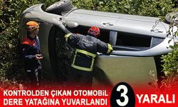 Kontrolden çıkan otomobil dere yatağına yuvarlandı, 3 yaralı