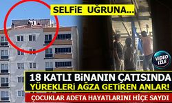 18 KATLI BİNANIN ÇATISINDA YÜREKLERİ AĞZA GETİREN ANLAR