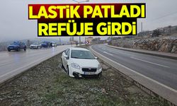 Lastik patladı refüje girdi