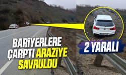 Bariyerlere çarptı araziye savruldu: 2 yaralı
