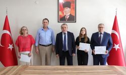 Kaymakam Öztürk’ten Türkiye Derecesi Elde Eden Öğrencilere Ödül