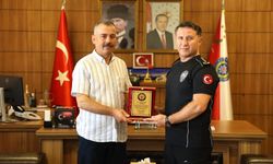 Emekli polis memuru Sezai Yurt’a veda plaketi
