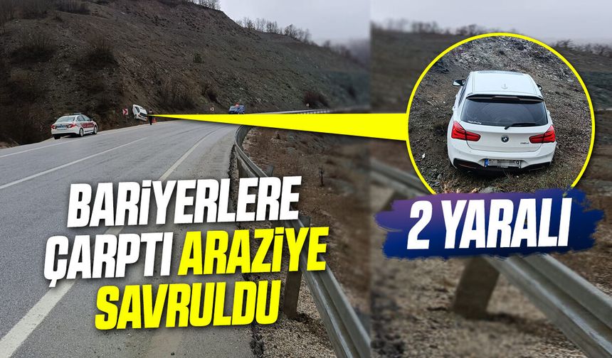 Bariyerlere çarptı araziye savruldu: 2 yaralı